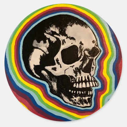 Large circle sticker of a skull with rainbow around it.